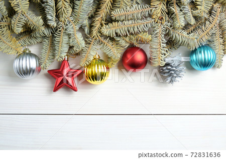 Christmas white wooden pattern with Christmas tree branches and toys Christmas white wooden pattern with Christmas tree branches and toys 72831636
