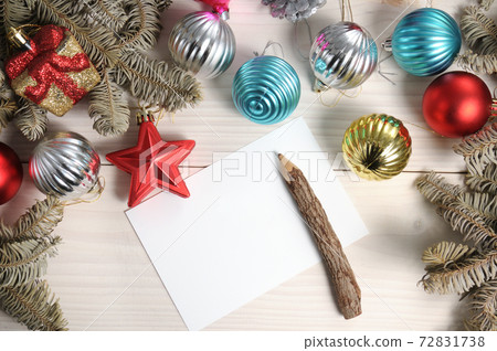 Christmas white wooden pattern with Christmas tree branches and toys Christmas white wooden pattern with Christmas tree branches and toys 72831738