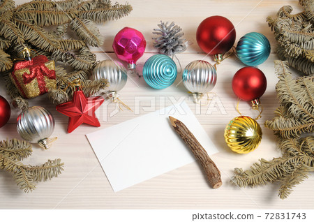 Christmas white wooden pattern with Christmas tree branches and toys Christmas white wooden pattern with Christmas tree branches and toys 72831743