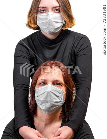 Girl and woman in medical protective mask Girl and woman in medical protective mask 72831981