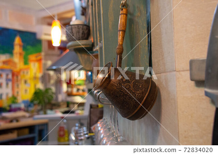 Blue kitchen decor. Blue tiles for the kitchen. Coffee maker. Blue kitchen decor. Blue tiles for the kitchen. Coffee maker. 72834020