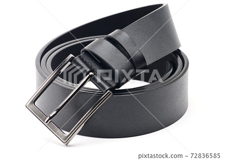 Black belt with a metal fastener on a white background 72836585