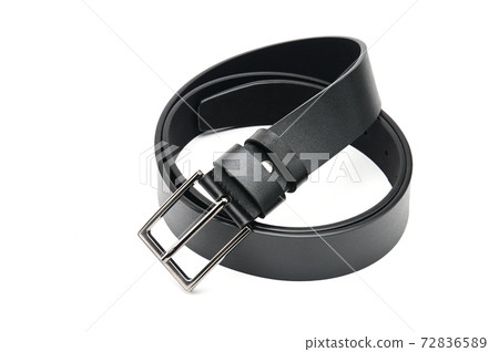 Black belt with a metal fastener on a white background 72836589