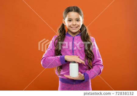 Dietary supplement for children. Take vitamin supplements. Girl  72838132