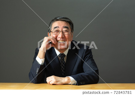 Businessman smile 72843781