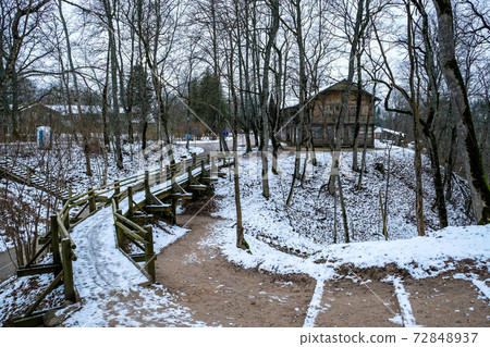 The Ruins of the 13th Century Krimulda Stone Castle and park at Krimulda in winter. Krimulda is near Sigulda, in Latvia, Europe 72848937