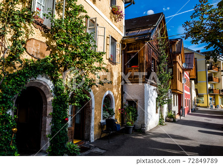 Historic Buildings At Promenade Street Through The Lakeside Town Hallstatt in Austria Historic Buildings At Promenade Street Through The Lakeside Town Hallstatt in Austria 72849789