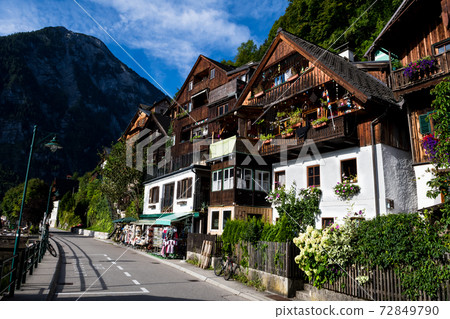 Historic Buildings At Promenade Street Through The Lakeside Town Hallstatt in Austria Historic Buildings At Promenade Street Through The Lakeside Town Hallstatt in Austria 72849790