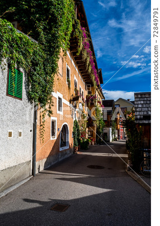 Historic Buildings At Promenade Street Through The Lakeside Town Hallstatt in Austria Historic Buildings At Promenade Street Through The Lakeside Town Hallstatt in Austria 72849791