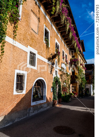 Historic Buildings At Promenade Street Through The Lakeside Town Hallstatt in Austria Historic Buildings At Promenade Street Through The Lakeside Town Hallstatt in Austria 72849793