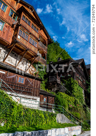 Historic Buildings At Promenade Street Through The Lakeside Town Hallstatt in Austria Historic Buildings At Promenade Street Through The Lakeside Town Hallstatt in Austria 72849794
