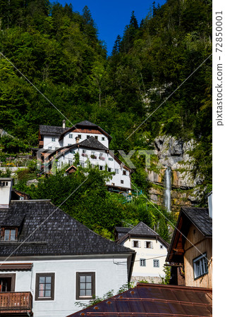 Spectacular Buildings Beneath Waterfall In The Lakeside Town Hallstatt in Austria Spectacular Buildings Beneath Waterfall In The Lakeside Town Hallstatt in Austria 72850001