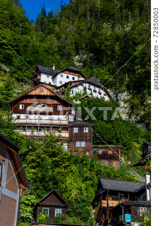 Spectacular Buildings Beneath Waterfall In The Lakeside Town Hallstatt in Austria Spectacular Buildings Beneath Waterfall In The Lakeside Town Hallstatt in Austria 72850003