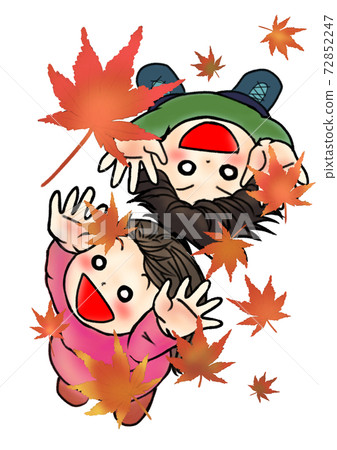 Boys and girls holding their hands over the fallen leaves Boys and girls holding their hands over the fallen leaves 72852247