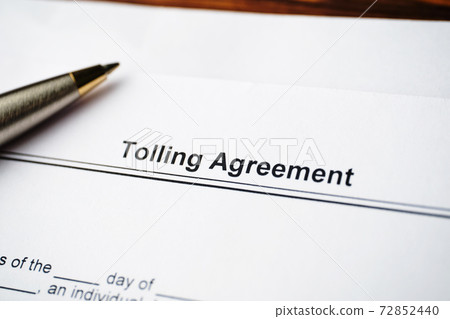 Legal document Tolling Agreement on paper close up. 72852440