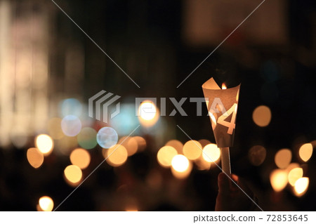thousands of people attend the Tiananmen square 25th anniversary candlelight vigils in Victoria park in hong kong thousands of people attend the Tiananmen square 25th anniversary candlelight vigils in Victoria park in hong kong 72853645