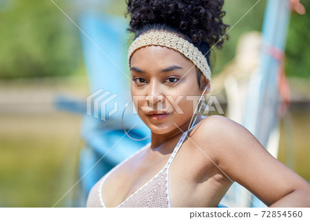 Close-Up Portrait Of Beautiful Asian Girl Close-Up Portrait Of Beautiful Asian Girl 72854560