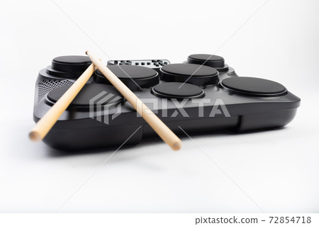 electronic drums portable music device, white background 72854718