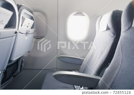 airline passenger seat and side window airline passenger seat and side window 72855128