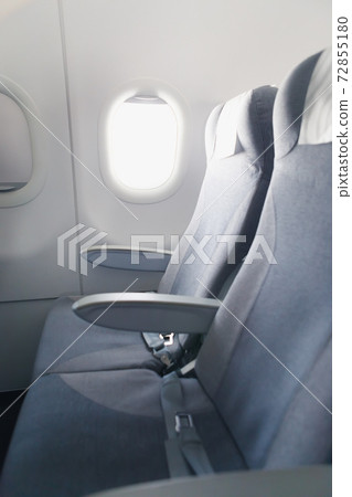 airline passenger seats and side window 72855180