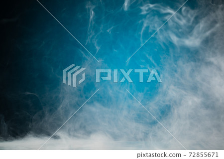 dense smoke on blue background 72855671