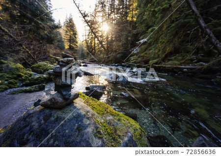 Stack of Rocks by the beautiful river in Canadian Nature Stack of Rocks by the beautiful river in Canadian Nature 72856636