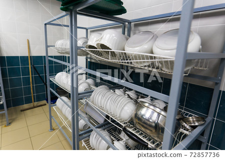 Restaurant kitchen equipment for preparing food, meal, plates, detail. Restaurant kitchen equipment for preparing food, meal, plates, detail. 72857736