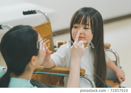5-year-old child in a wheelchair 5-year-old child in a wheelchair 72857810