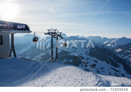 Ski lift booths at a ski resort. Ski lift booths at a ski resort. 72859439