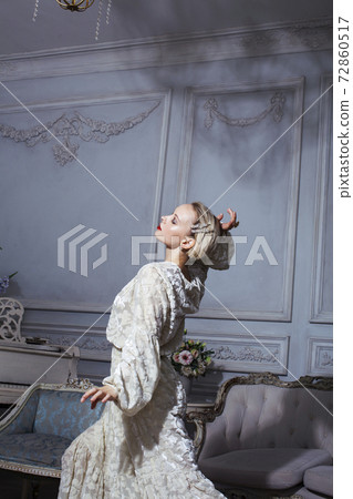 pretty blond woman in rich luxury house interior, fashion people concept pretty blond woman in rich luxury house interior, fashion people concept 72860517