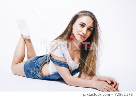 young pretty teenage girl posing cheerful on white background isolated, lifestyle people concept young pretty teenage girl posing cheerful on white background isolated, lifestyle people concept 72861178