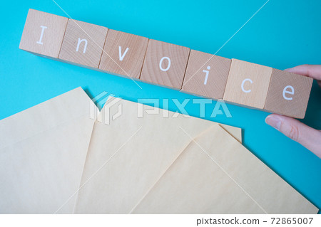 Envelopes and invoices | Invoice letters made from 3 brown envelopes and building blocks | 72865007