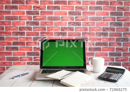 laptop with blank screen on office desk. laptop with blank screen on office desk. 72868275