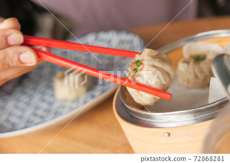 close up of steamed dim sum in a bowl close up of steamed dim sum in a bowl 72868281