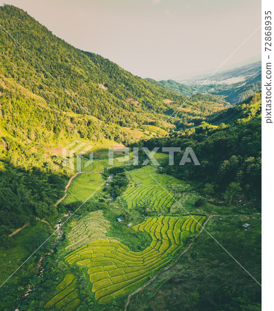Aerial view of Nang Lae Nai Rice Terraces in Chiang Rai, Chiang Mai province, Thailand Aerial view of Nang Lae Nai Rice Terraces in Chiang Rai, Chiang Mai province, Thailand 72868935