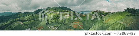 Aerial view of camping grounds and tents on Doi Mon Cham mountain in Mae Rim, Chiang Mai province Aerial view of camping grounds and tents on Doi Mon Cham mountain in Mae Rim, Chiang Mai province 72869482
