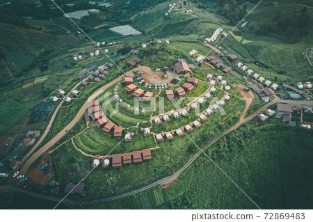 Aerial view of camping grounds and tents on Doi Mon Cham mountain in Mae Rim, Chiang Mai province Aerial view of camping grounds and tents on Doi Mon Cham mountain in Mae Rim, Chiang Mai province 72869483