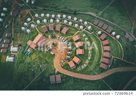 Aerial view of camping grounds and tents on Doi Mon Cham mountain in Mae Rim, Chiang Mai province Aerial view of camping grounds and tents on Doi Mon Cham mountain in Mae Rim, Chiang Mai province 72869614