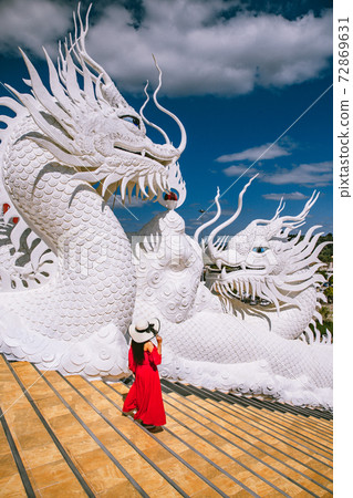 Wat Huay Pla Kang, white big buddha and dragons in Chiang Rai, Chiang Mai province, Thailand 72869631