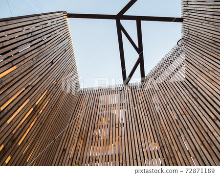 Walls of thin wooden slats on the street Walls of thin wooden slats on the street 72871189