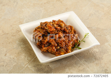 Canned anchovy in tomato sauce 72872405