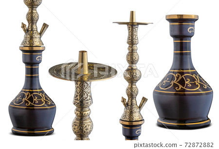 Isolated handcrafted engraved water pipe or hookah. Isolated handcrafted engraved water pipe or hookah. 72872882