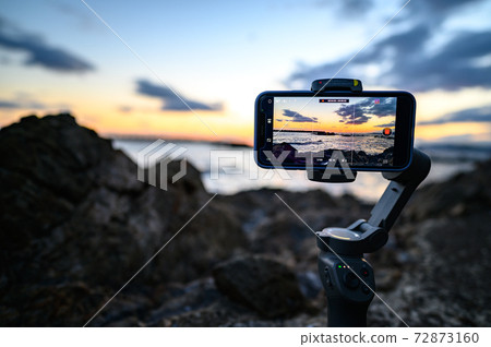 Time-lapse photography of the sunset 72873160