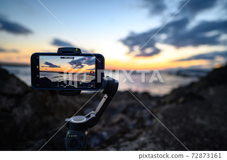 Time-lapse photography of the sunset 72873161