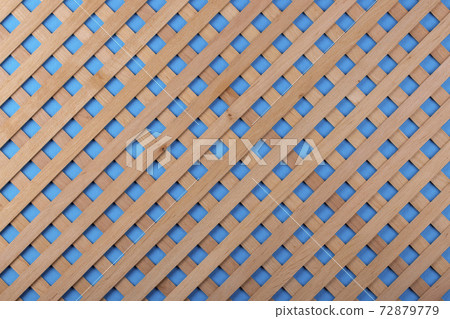 Texture of decorative wooden lattice with colored background Texture of decorative wooden lattice with colored background 72879779