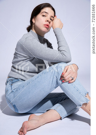Dark hair caucasian girl on grey Dark hair caucasian girl on grey 72881666