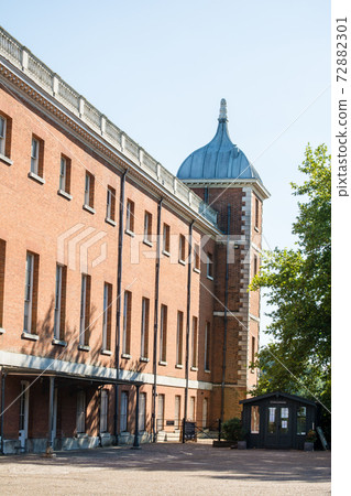 A large red brick historic building at Osterley Park on the outskirts of London A large red brick historic building at Osterley Park on the outskirts of London 72882301