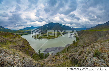 The place is the confluence of two famous altai rivers Chuya and Katun. Panorama of the Katun river valley in a beautiful sunny day. Rest on the Katun River. Altai landscape 72883307