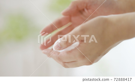 Woman washing hands with soap Woman washing hands with soap 72888417