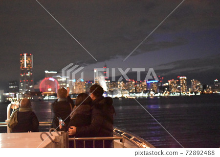 A couple observing the night view from a cruise ship in Yokohama (rear view) A couple observing the night view from a cruise ship in Yokohama (rear view) 72892488